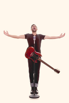 male singer with guitar