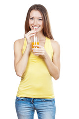 Beautiful brunette woman holding glass of juice