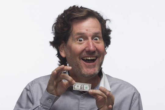 Happy man with dollar bill, horizontal