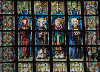 Roman catholic saints on a stained glass window