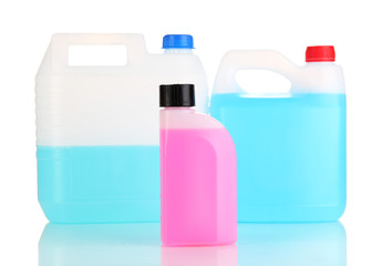 Different liquids for car in canisters isolated on white