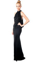 Obraz na płótnie Canvas Beautiful fashion model in an evening gown