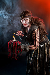 woman wearing as scandinavian witch. Halloween