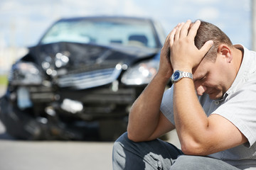 upset man after car crash - 55612957