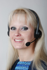 Portrait of young woman with headset