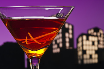 Metropolis Manhattan cocktail in city skyline setting