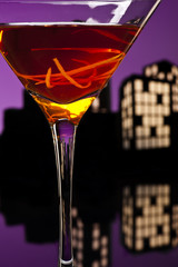 Metropolis Manhattan cocktail in city skyline setting