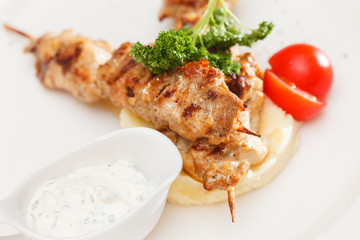 Skewered meat with vegetables