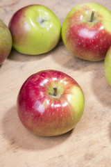 apples on a wooden background