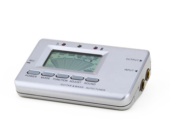 guitar and bass auto tuner in a white background