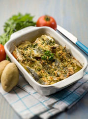 cake with anchovies tomato and potatoes, selective focus