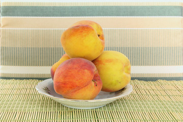 peach fruits in plate