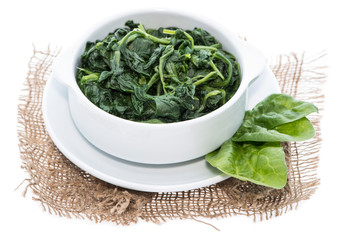 Cooked Spinach isolated on white