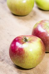 apples on a wooden background