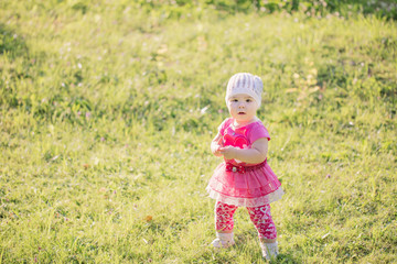 Summer portrait of beautiful baby girl