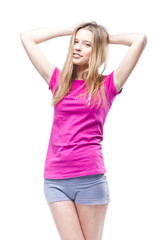 Fototapeta premium Young beautiful woman wearing pink t-shirt