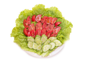 cucumbers and tomatoes with salt and pepper