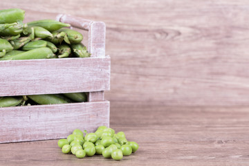 peas in wooden box
