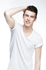 young man touching his hair