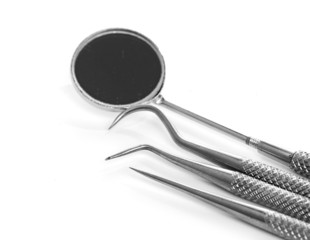 Basic dentist tools isolated on white