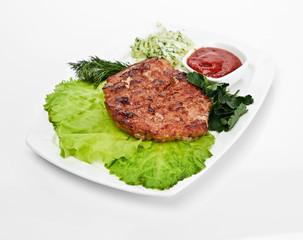Grilled steak on a white plate