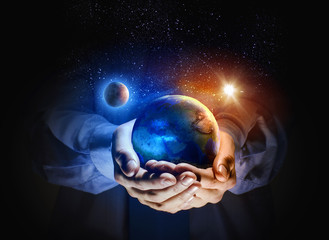 Earth planet in hands