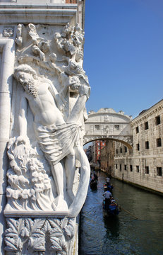 Bridge of Sighs and statue of Doges Palace, Venice, Italy