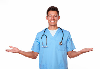 Male in nurse uniform holding palms out