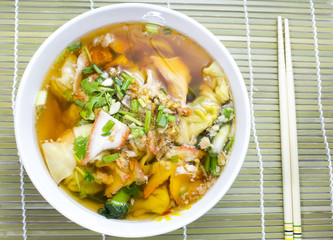 Soup with sliced pork and dumplings