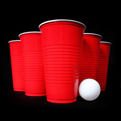 Beer pong. Red plastic cups and ping pong ball over black