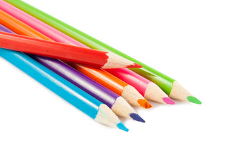 Colour pencils isolated on white background close up