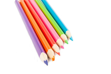 Colour pencils isolated on white background close up