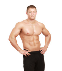 Fototapeta premium Healthy muscular young man. Isolated on white background