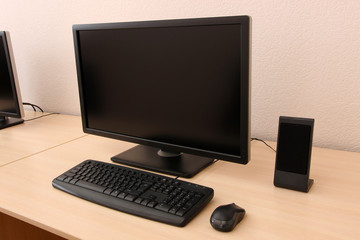 Computer on table in room