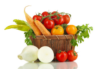 Fresh vegetables in basket isolated on white