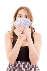 Atractive girl playing cards isolated on white background