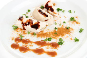 Boiled chicken meat with paprika and sauce, isolated on white