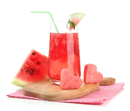 Fresh watermelon and glass of watermelon juice isolated on