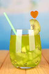 Tasty cocktail on swimming pool background