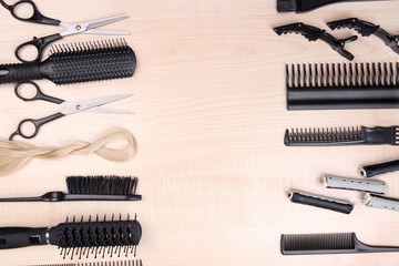 Professional hairdresser tools on table close-up