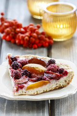 Piece of tart on white plate. Selective focus