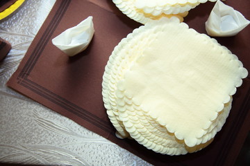  pile of yellow paper napkin on table