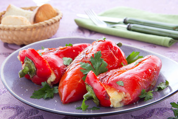 Roasted peppers stuffed with feta cheese, selective focus.