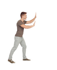 Young man pushing something