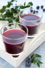 Blueberry juice in a glass.