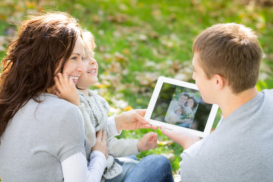 Family Using Tablet PC