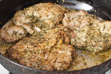 Grilled pork steak meat with herbs and spices