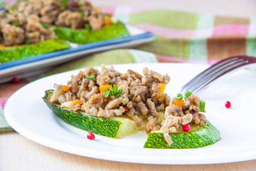Fried minced meat beef and pork with carrot and parsley on slice