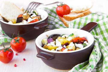 Baked vegetables with feta cheese in Greek style
