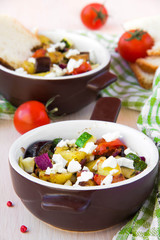 Baked vegetables with feta cheese in Greek style
